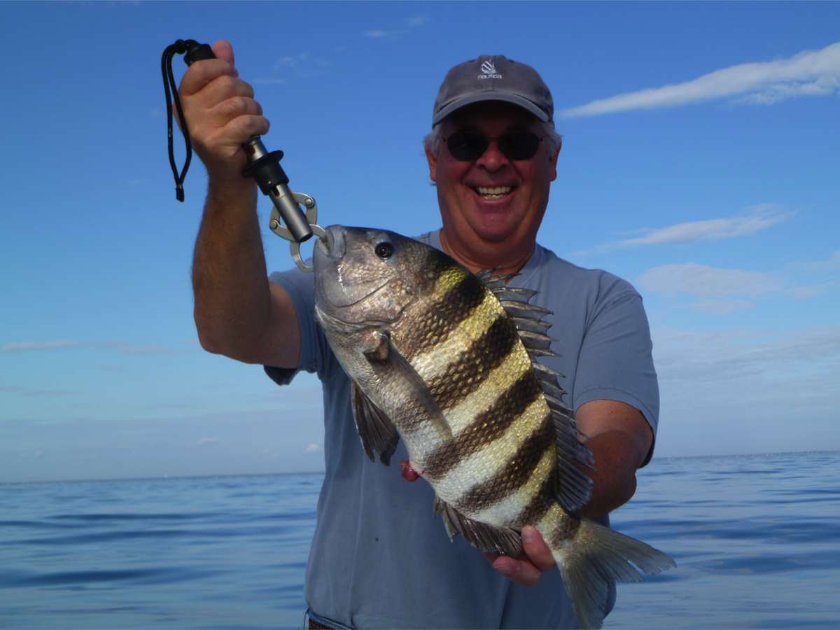First Step Fishing Excursions: Near Shore & Reef Full Day
